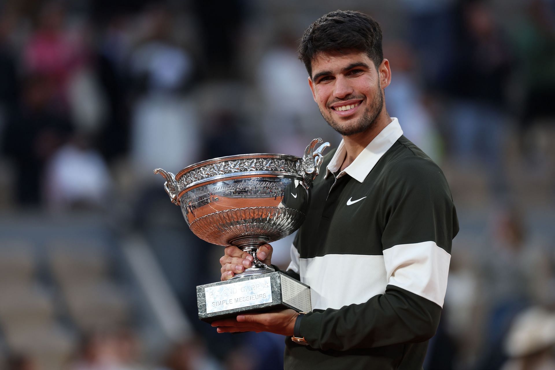 Alcaraz with the winner's trophy at the 2025 French Open - Day Fifteen - Source: Getty